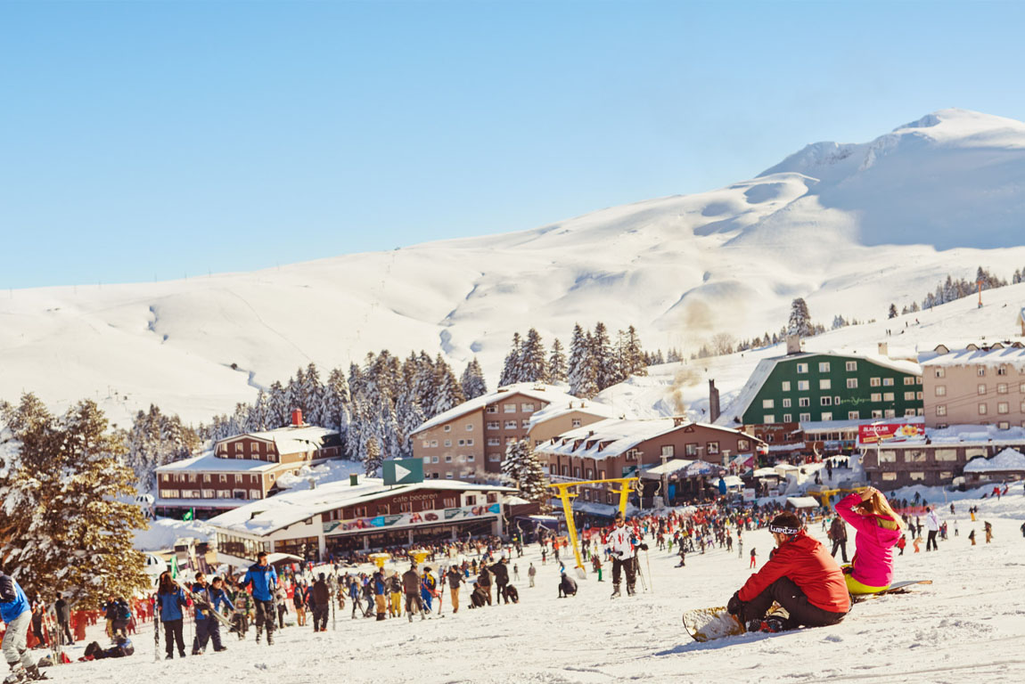 Skiing and snowboarding in winter resort Uludag