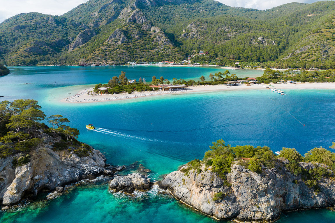 Paragliding into the sunset over the ocean