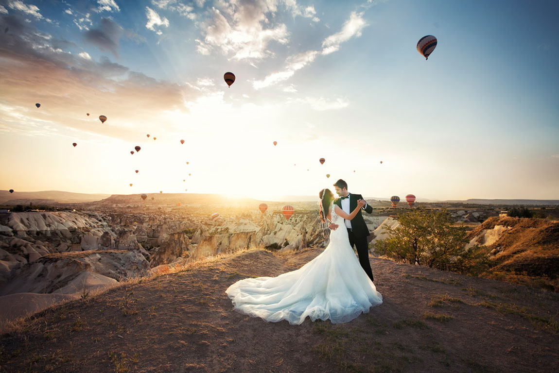 Cute cat sits on a table in small cafe in Uçhisar Castle